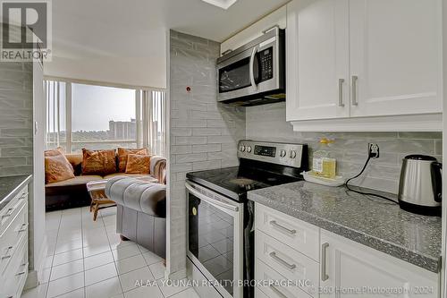 1206 - 1 Rowntree Road, Toronto (Mount Olive-Silverstone-Jamestown), ON - Indoor Photo Showing Kitchen With Upgraded Kitchen