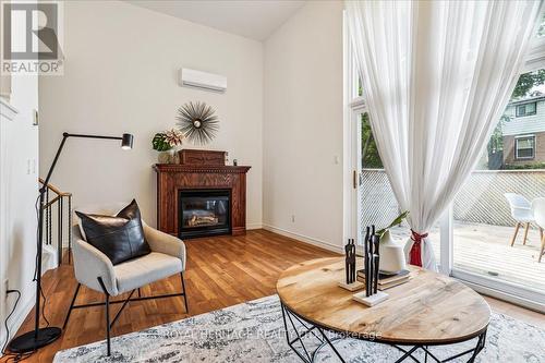 1 - 1370 Fieldlight Boulevard, Pickering, ON - Indoor Photo Showing Living Room With Fireplace