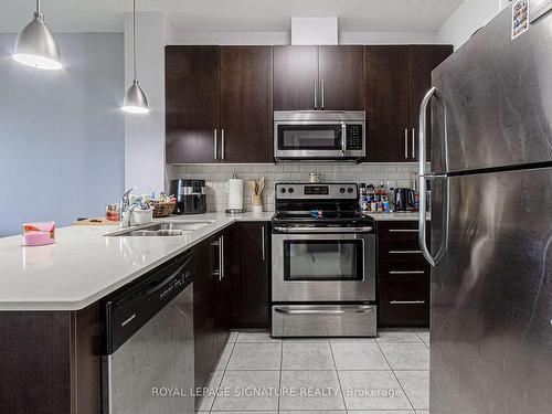 422-33 Whitmer St, Milton, ON - Indoor Photo Showing Kitchen With Stainless Steel Kitchen With Double Sink