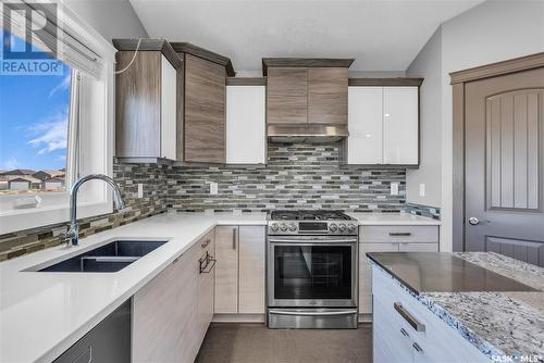 750 Bolstad Turn, Saskatoon, SK - Indoor Photo Showing Kitchen With Double Sink With Upgraded Kitchen