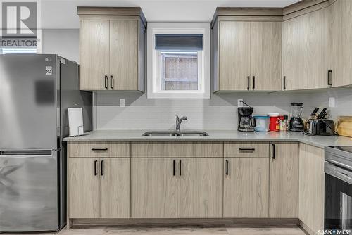 750 Bolstad Turn, Saskatoon, SK - Indoor Photo Showing Kitchen With Double Sink