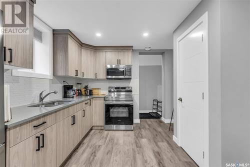 750 Bolstad Turn, Saskatoon, SK - Indoor Photo Showing Kitchen With Double Sink