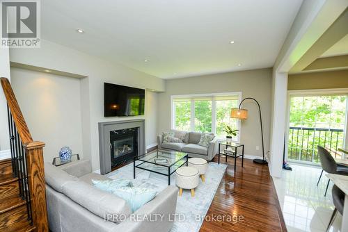 1583 Eglinton Avenue W, Mississauga, ON - Indoor Photo Showing Living Room With Fireplace