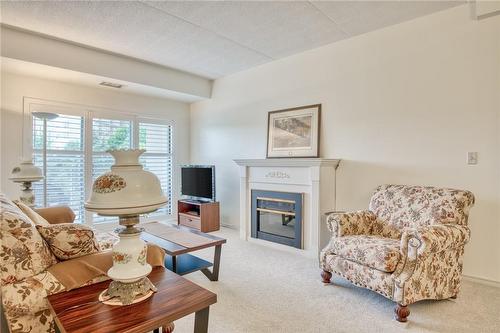 2075 Amherst Heights Drive|Unit #405, Burlington, ON - Indoor Photo Showing Living Room With Fireplace