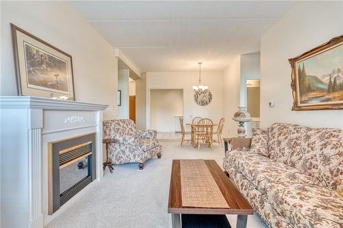 2075 Amherst Heights Drive|Unit #405, Burlington, ON - Indoor Photo Showing Living Room With Fireplace