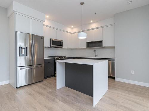 606-967 Whirlaway Cres, Langford, BC - Indoor Photo Showing Kitchen With Upgraded Kitchen