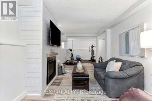 35 Reid Crescent, Collingwood, ON - Indoor Photo Showing Other Room With Fireplace