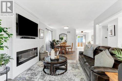 35 Reid Crescent, Collingwood, ON - Indoor Photo Showing Living Room With Fireplace