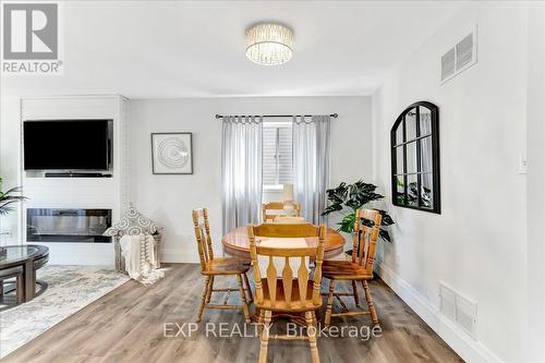 35 Reid Crescent, Collingwood, ON - Indoor Photo Showing Dining Room With Fireplace