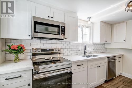 3 Hardwood Drive, Georgina (Sutton & Jackson'S Point), ON - Indoor Photo Showing Kitchen With Double Sink