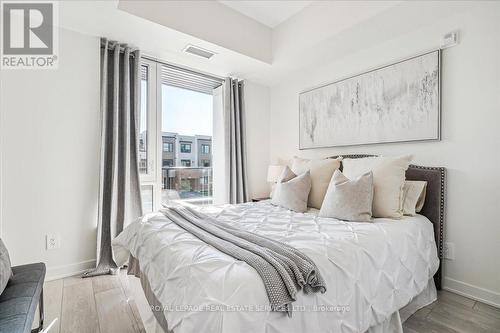 202 - 1440 Clarriage Court, Milton, ON - Indoor Photo Showing Bedroom