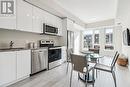 202 - 1440 Clarriage Court, Milton, ON  - Indoor Photo Showing Kitchen 