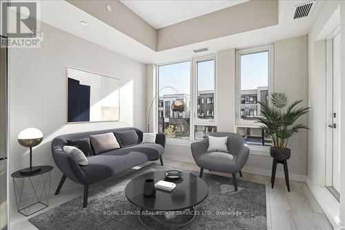 202 - 1440 Clarriage Court, Milton, ON - Indoor Photo Showing Living Room