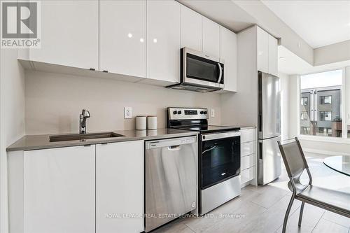 202 - 1440 Clarriage Court, Milton, ON - Indoor Photo Showing Kitchen With Upgraded Kitchen