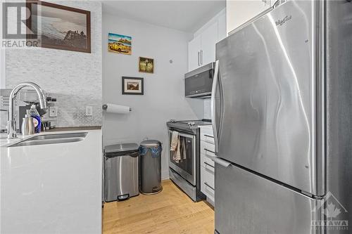 stainless steel appliances - 485 Richmond Road Unit#502, Ottawa, ON - Indoor Photo Showing Kitchen With Double Sink With Upgraded Kitchen