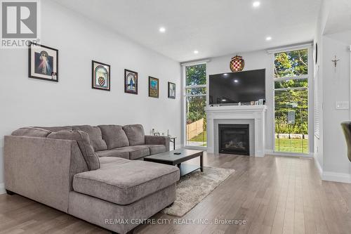 95 Optimist Drive, Southwold (Talbotville), ON - Indoor Photo Showing Living Room With Fireplace