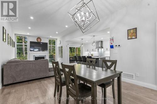 95 Optimist Drive, Southwold (Talbotville), ON - Indoor Photo Showing Dining Room With Fireplace