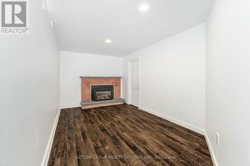 11 Abell Drive, Brampton (Madoc), ON - Indoor Photo Showing Living Room With Fireplace