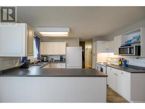 264 Portage Street, Prince George, BC - Indoor Photo Showing Kitchen With Double Sink