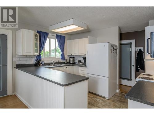 264 Portage Street, Prince George, BC - Indoor Photo Showing Kitchen With Double Sink