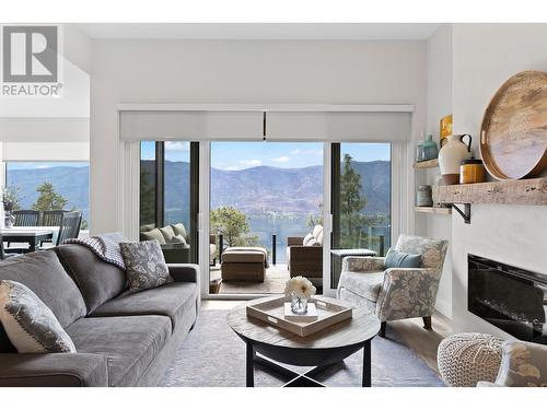 3308 Aspen Lane, Kelowna, BC - Indoor Photo Showing Living Room With Fireplace