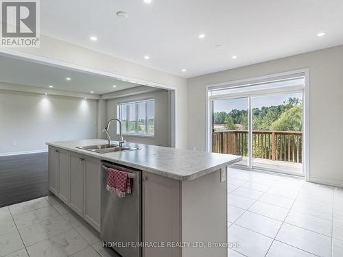 116 Eva Drive, Woolwich, ON - Indoor Photo Showing Kitchen With Double Sink