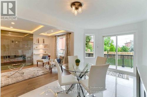 550 Meadows Boulevard, Mississauga (Rathwood), ON - Indoor Photo Showing Dining Room With Fireplace