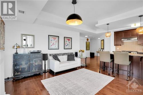 Oversized island allows for versatile dining and living spaces - 575 Byron Avenue Unit#413, Ottawa, ON - Indoor