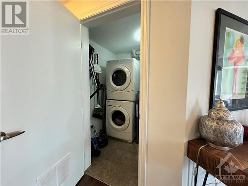 Laundry and extra storage space set away from bedrooms - 575 Byron Avenue Unit#413, Ottawa, ON - Indoor Photo Showing Laundry Room