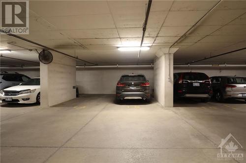 Convenient parking and storage locker included - 575 Byron Avenue Unit#413, Ottawa, ON - Indoor Photo Showing Garage