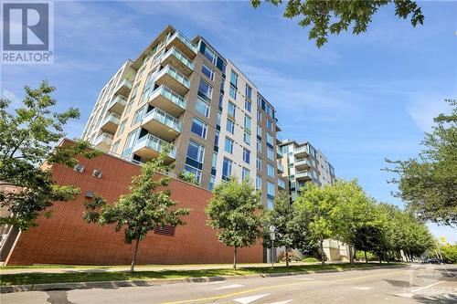 Entrance to parking garage off Byron Avenue - 575 Byron Avenue Unit#413, Ottawa, ON - Outdoor With Balcony With Facade