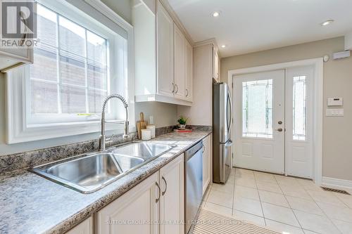 23 Hartley Avenue, Toronto (Briar Hill-Belgravia), ON - Indoor Photo Showing Kitchen With Double Sink