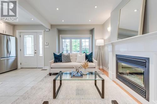 23 Hartley Avenue, Toronto (Briar Hill-Belgravia), ON - Indoor Photo Showing Living Room With Fireplace