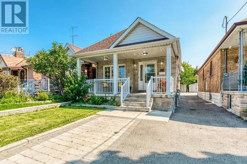 23 Hartley Avenue, Toronto (Briar Hill-Belgravia), ON - Outdoor With Deck Patio Veranda With Facade