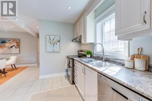 23 Hartley Avenue, Toronto, ON - Indoor Photo Showing Kitchen With Double Sink