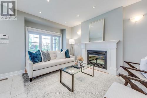 23 Hartley Avenue, Toronto, ON - Indoor Photo Showing Living Room With Fireplace