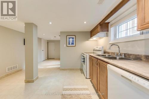 23 Hartley Avenue, Toronto, ON - Indoor Photo Showing Kitchen With Double Sink