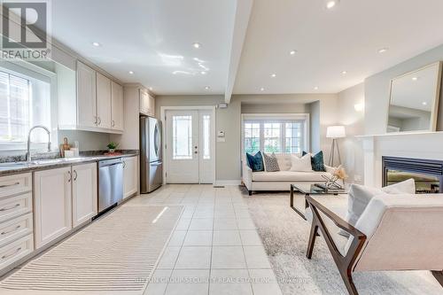 23 Hartley Avenue, Toronto (Briar Hill-Belgravia), ON - Indoor With Fireplace