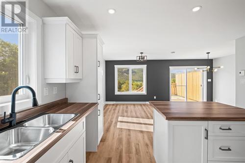 25A Millers Road, Cbs, NL - Indoor Photo Showing Kitchen With Double Sink