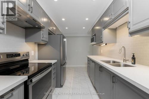 903 - 155 Marlee Avenue, Toronto (Briar Hill-Belgravia), ON - Indoor Photo Showing Kitchen With Stainless Steel Kitchen With Double Sink With Upgraded Kitchen