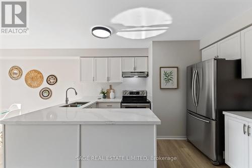 48 Henderson Crescent, New Tecumseth, ON - Indoor Photo Showing Kitchen With Stainless Steel Kitchen With Double Sink