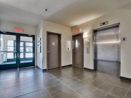 Elevator - 301-119 Rue Turgeon, Sainte-Thérèse, QC - Indoor Photo Showing Other Room