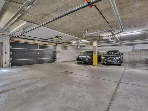 Garage - 301-119 Rue Turgeon, Sainte-Thérèse, QC - Indoor Photo Showing Garage