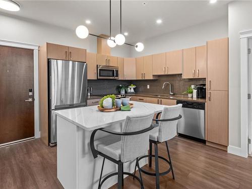 404-1900 Watkiss Way, View Royal, BC - Indoor Photo Showing Kitchen With Upgraded Kitchen