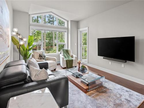 404-1900 Watkiss Way, View Royal, BC - Indoor Photo Showing Living Room