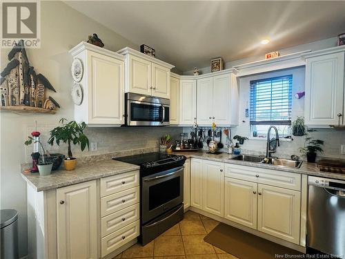 50 Allee Du Motel, Petit-Rocher, NB - Indoor Photo Showing Kitchen With Double Sink