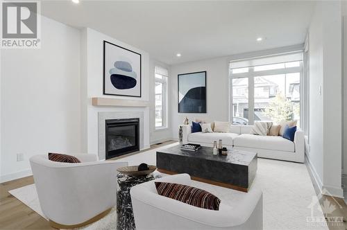 Virtually Staged - 525 Supernova Street, Ottawa, ON - Indoor Photo Showing Living Room With Fireplace