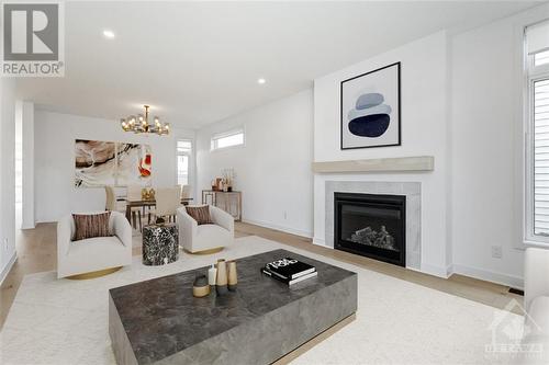 Virtually Staged - 525 Supernova Street, Ottawa, ON - Indoor Photo Showing Living Room With Fireplace