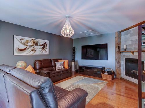 Salle familiale - 2-270 Rue Anne-Hébert, Saint-Basile-Le-Grand, QC - Indoor Photo Showing Living Room With Fireplace