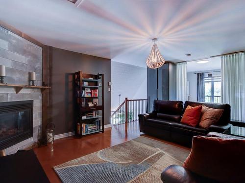 Family room - 2-270 Rue Anne-Hébert, Saint-Basile-Le-Grand, QC - Indoor Photo Showing Living Room With Fireplace